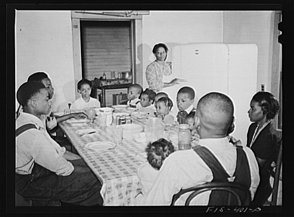 Black farm family dinner in Wake County, 1942. Courtesy Library of Congress, Prints & Photographs Division, FSA/OWI Collection, LC-USW3-000401