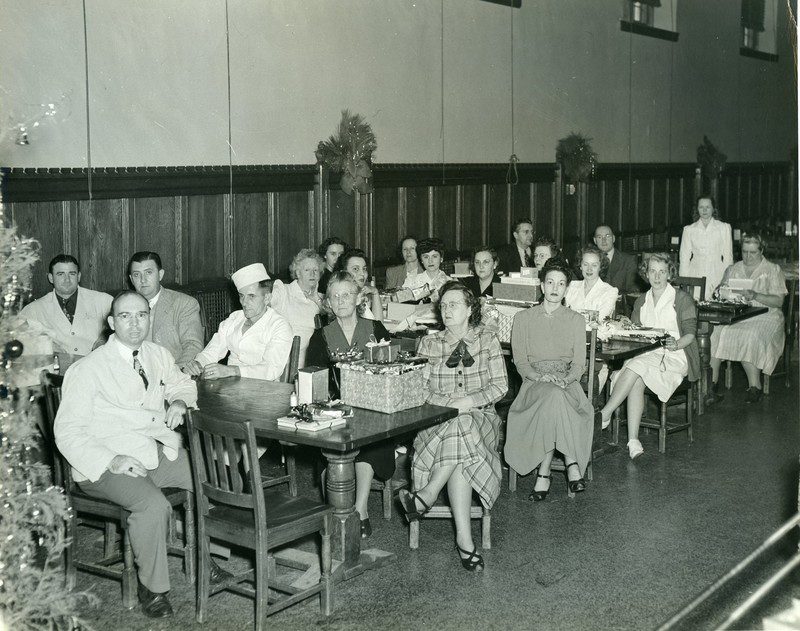 Holiday party for Duke dining staff in the 1950s. The room was segregated down the middle by race. Courtesy Theodore W. “Ted” Minah Records and Papers, Duke University Archives, David M. Rubenstein Rare Book & Manuscript Library, Duke University
