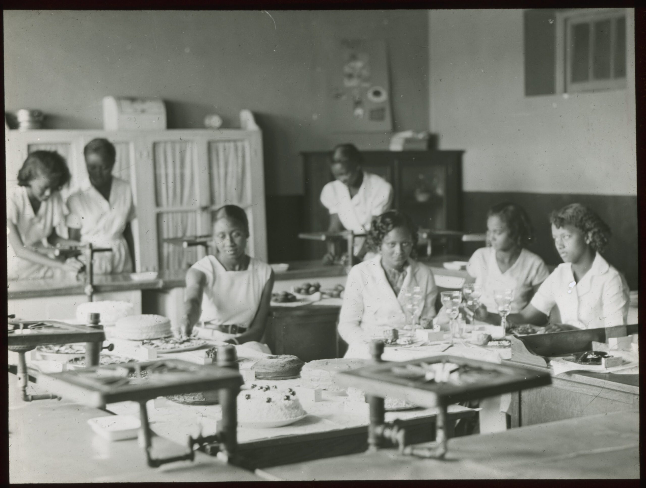 Black female students baking cakes in a home economics class in Durham City Schools, circa 1930s. Courtesy North Carolina Collection, Durham County Libraries