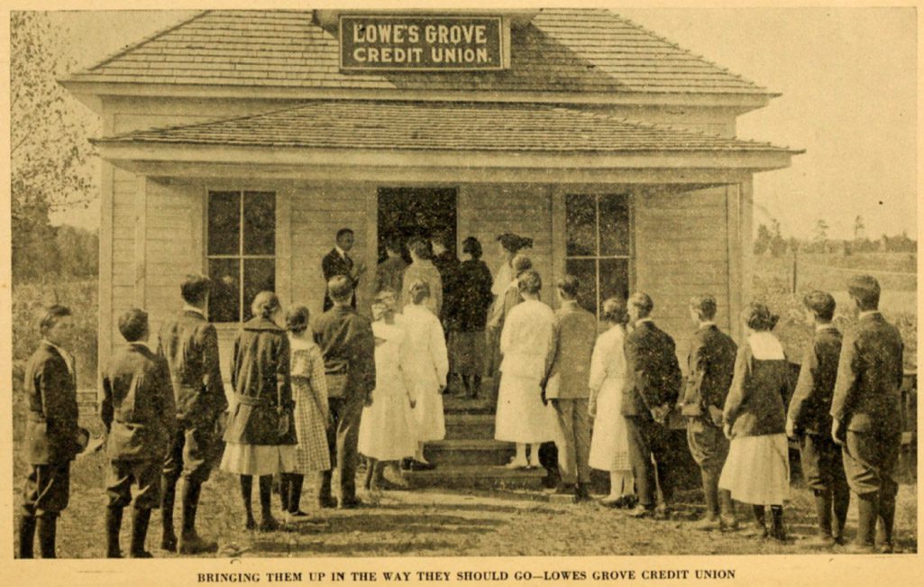 White patrons line up in front of Lowe's Grove Credit Union, formed in Durham County, 1916. Courtesy "Documents of Durham," North Carolina Collection, Durham County Libraries
